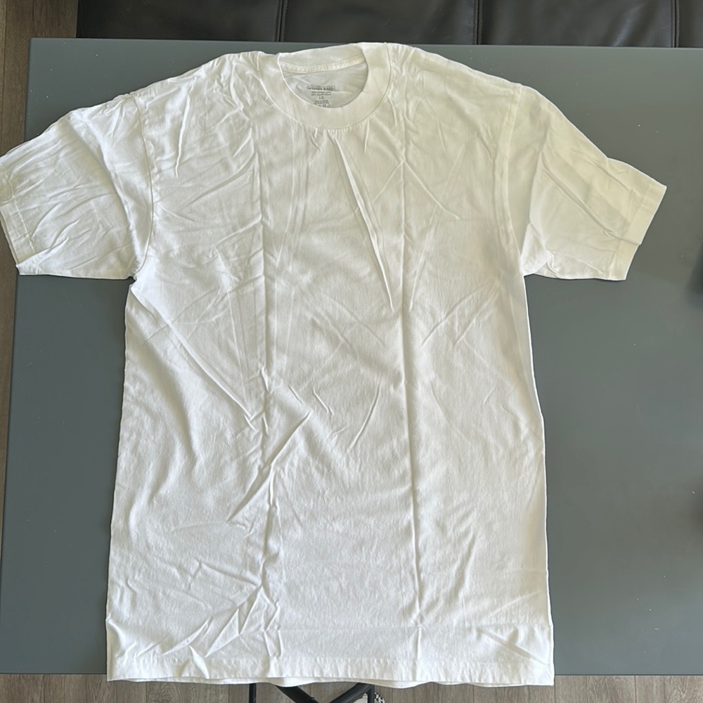 Brand new, white, short sleeve Kirkland shirt